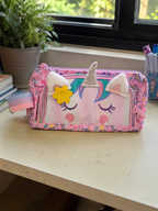 Pencil pouch with slots